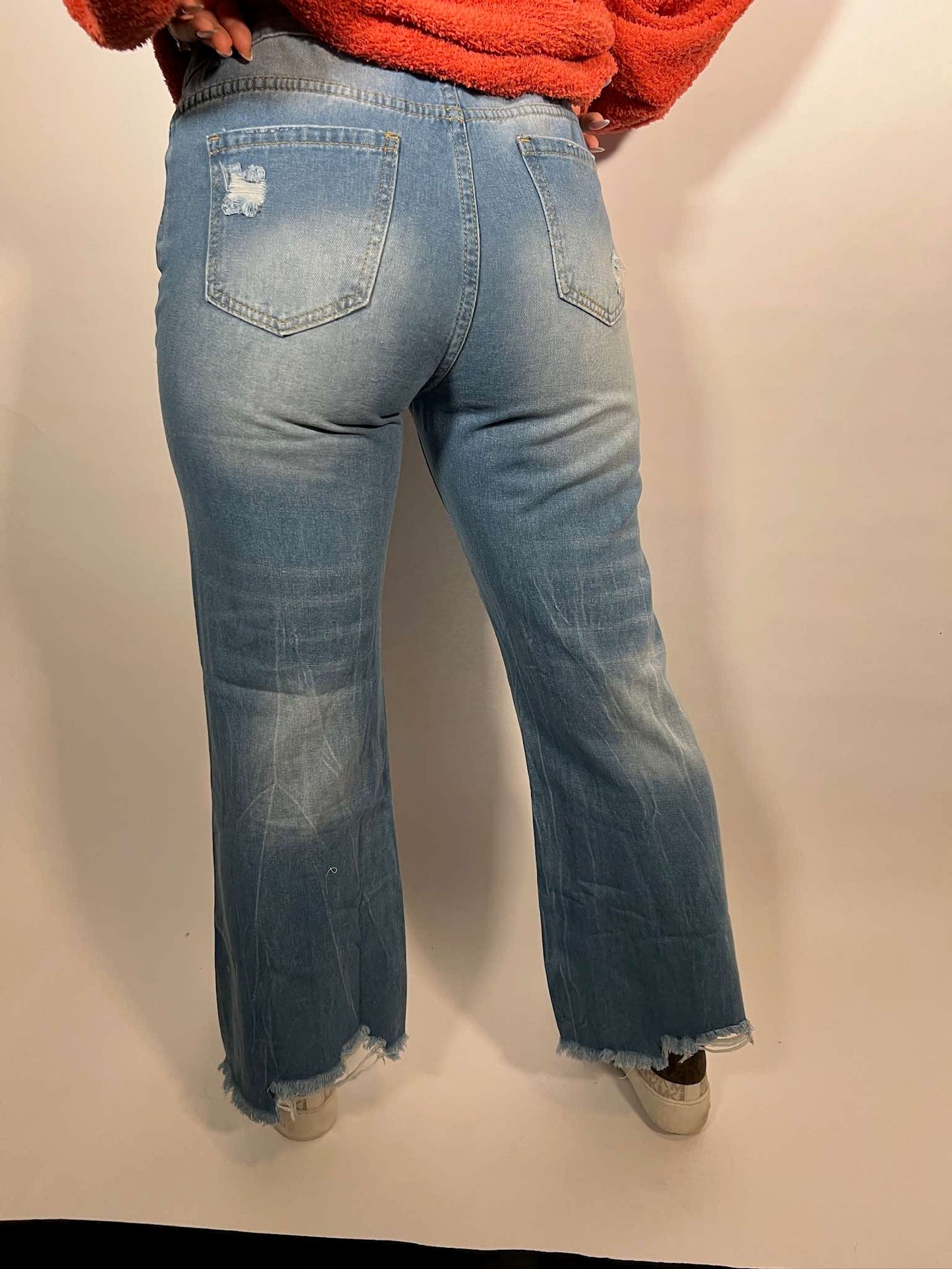 LONG JEANS WITH RIPPED FRINGE WASH