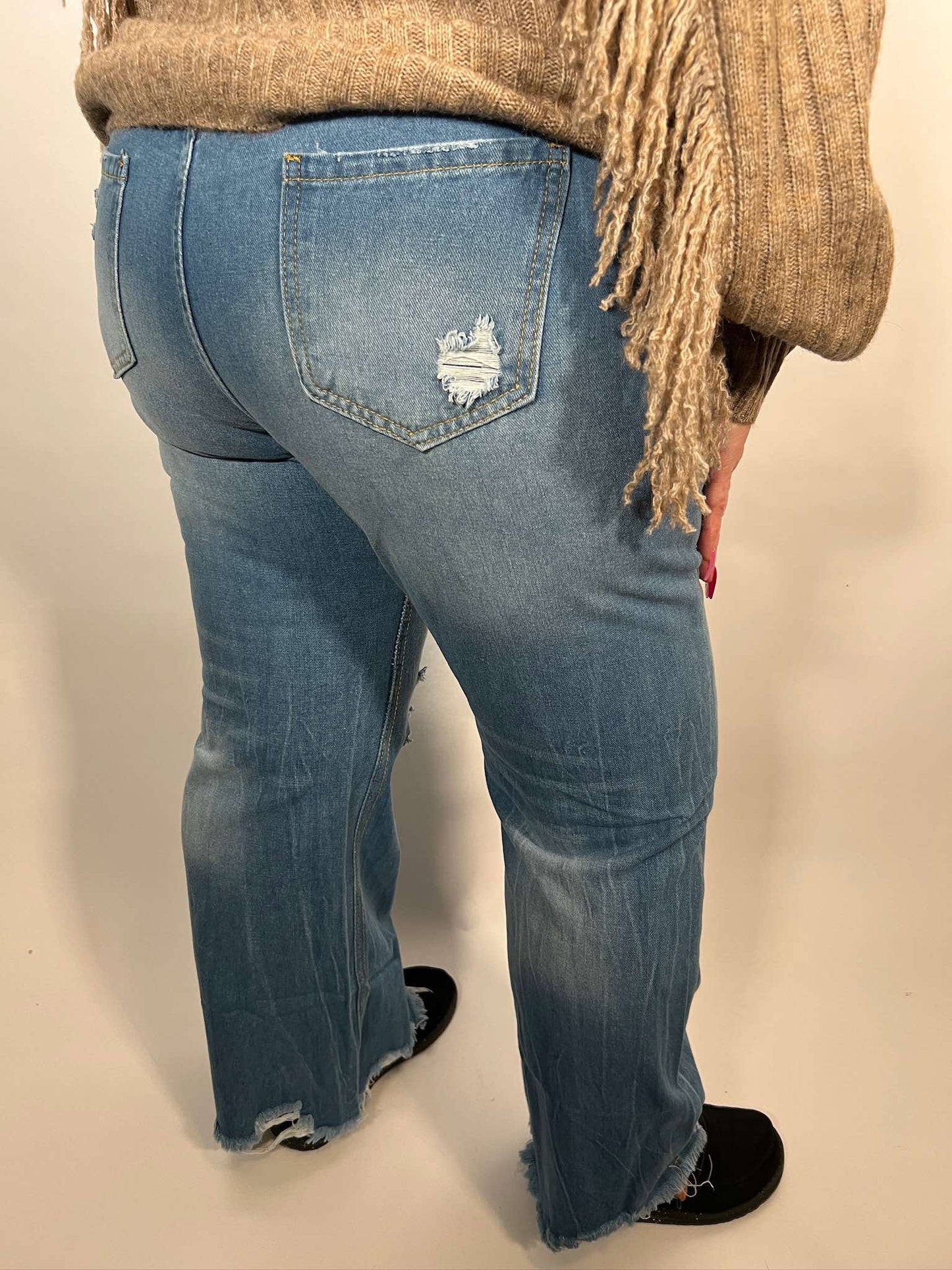 LONG JEANS WITH RIPPED FRINGE WASH